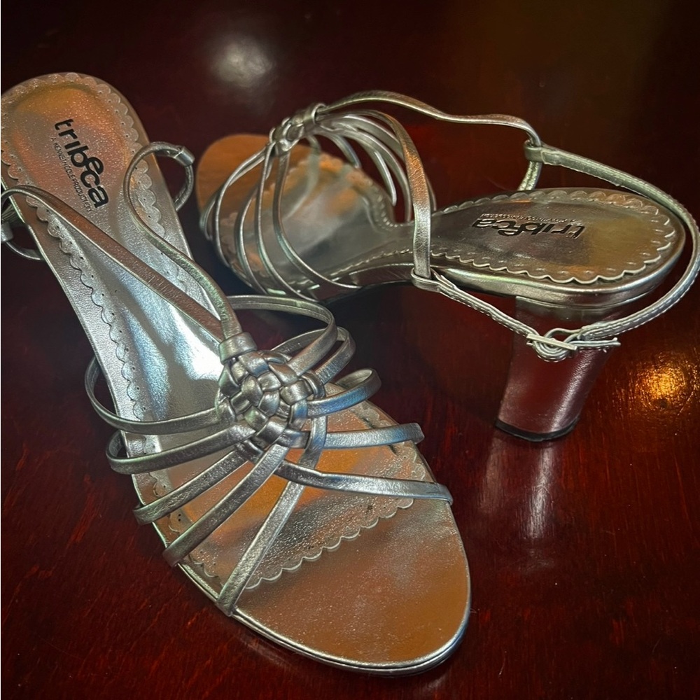 Silver high-heeled shoes